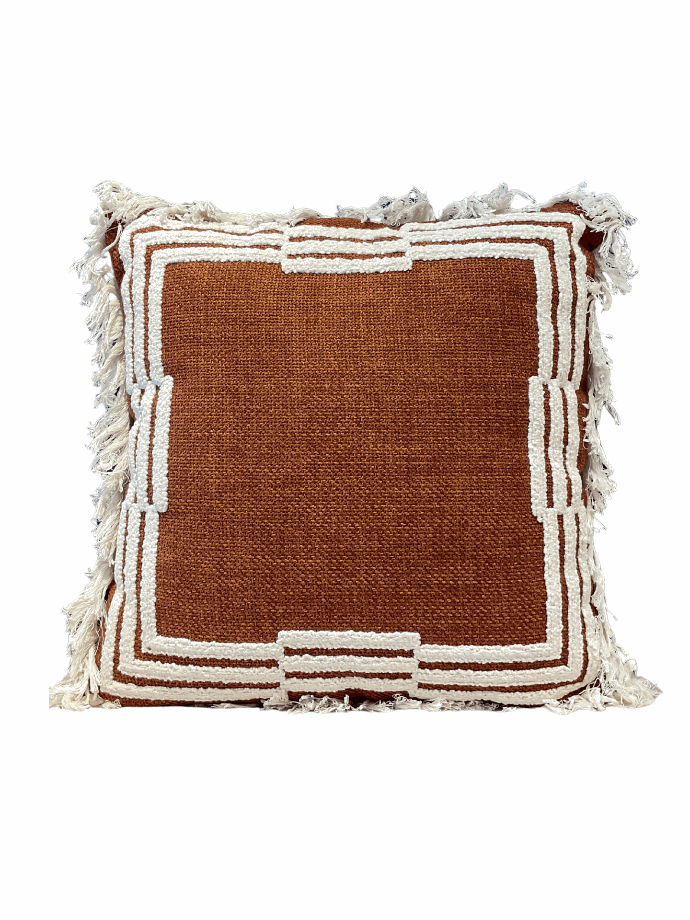 Terracotta border fringe cushion by Decortextil